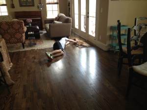 Doesn't love the cat while laying on the floor with him